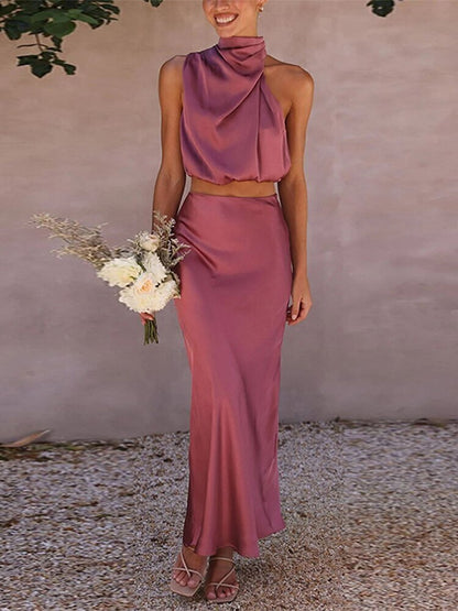 Conjunto Longo de Cetim Verde Claro com Blusa Gola Alta e Saia Fluida – Elegância e Sofisticação