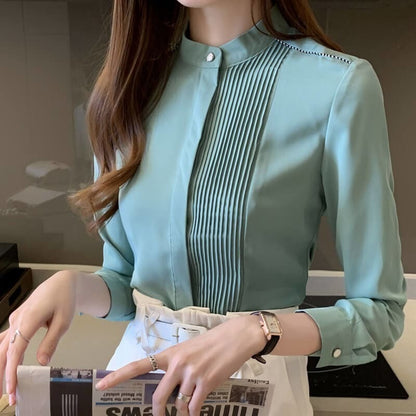 Camisa Feminina Manga Longa com Detalhes Plissados – Elegância e Sofisticação