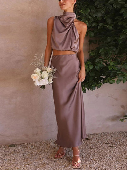 Conjunto Longo de Cetim Verde Claro com Blusa Gola Alta e Saia Fluida – Elegância e Sofisticação