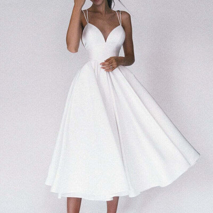 Vestido Longo de Alças Finas com Decote Profundo e Saia Rodada – Elegância e Sofisticação para Momentos Únicos