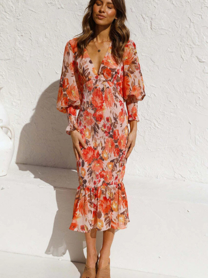 Vestido Midi Floral com Manga Longa Bufante e Babado na Barra – Feminilidade e Charme