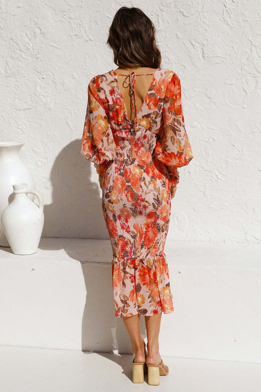 Vestido Midi Floral com Manga Longa Bufante e Babado na Barra – Feminilidade e Charme