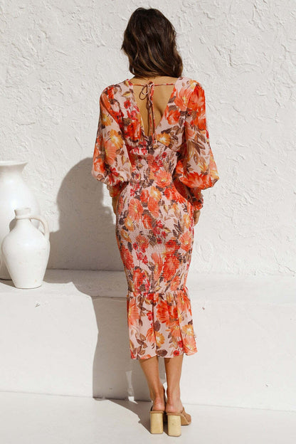 Vestido Midi Floral com Manga Longa Bufante e Babado na Barra – Feminilidade e Charme