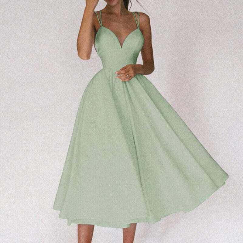 Vestido Longo de Alças Finas com Decote Profundo e Saia Rodada – Elegância e Sofisticação para Momentos Únicos